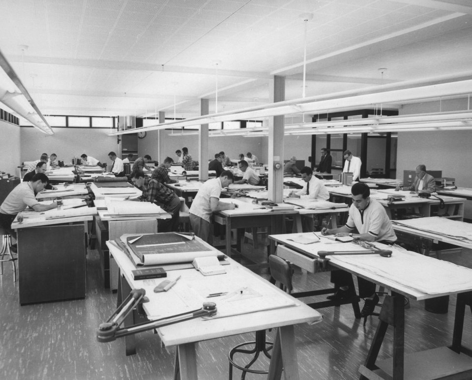 Historic Herrick drafting office with staff working at drawing tables
